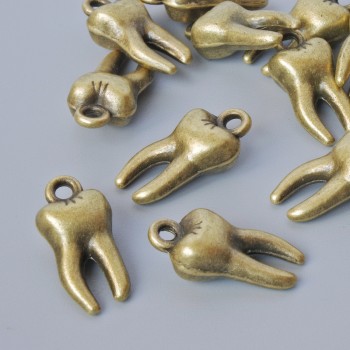 Colgante 'Diente', diámetro 15,5 × 7,5 mm, diámetro del agujero 1,6 mm, empaque 15 uds ±, color bronce del metal
