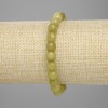 Pulsera de olivino facetado, bolas de 7,5 mm, longitud 18 cm, elástico