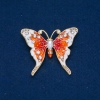 Broche «Mariposa» de metal dorado, esmalte y strass blancos 43×52 mm +